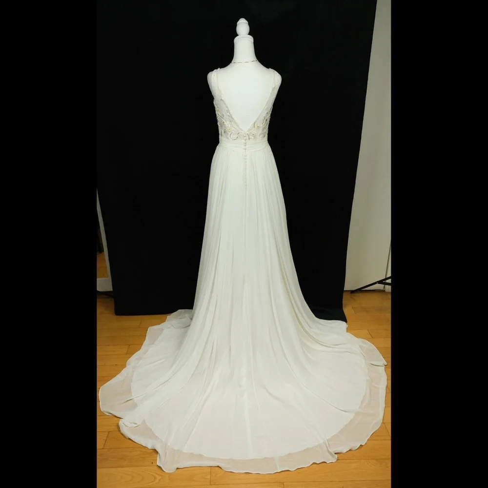 Preowned ivory and sand wedding gown dress. Size S. Very high quality. Size S - Picture 8 of 8